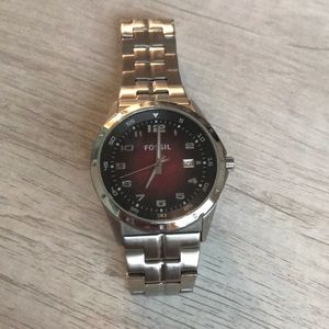 Men’s red face fossil watch